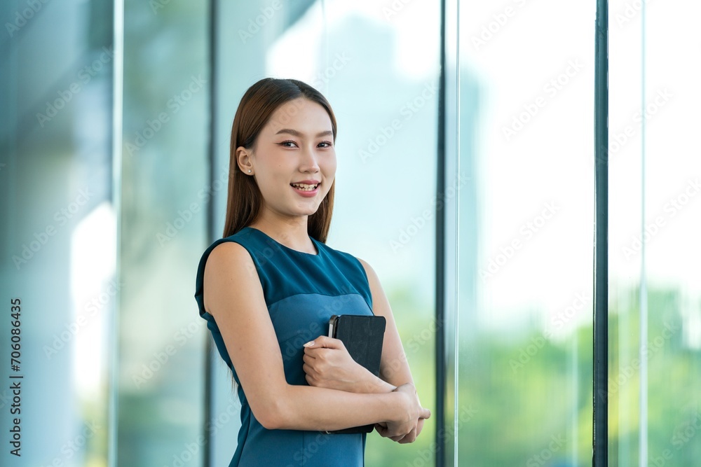 Young Asian Woman Holding a Digital Tablet Young Asian Woman Holding a Digital Tablet