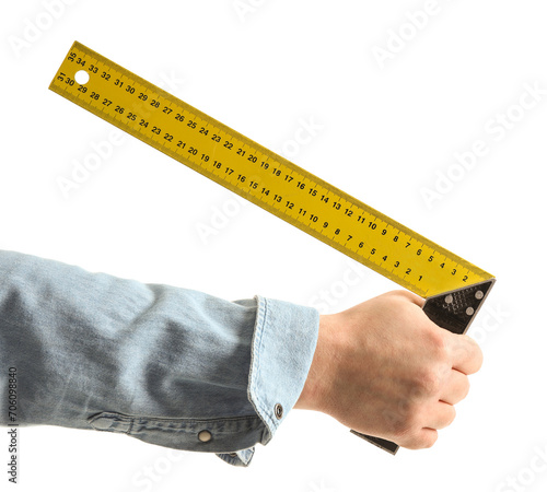Worker with ruler on white ...