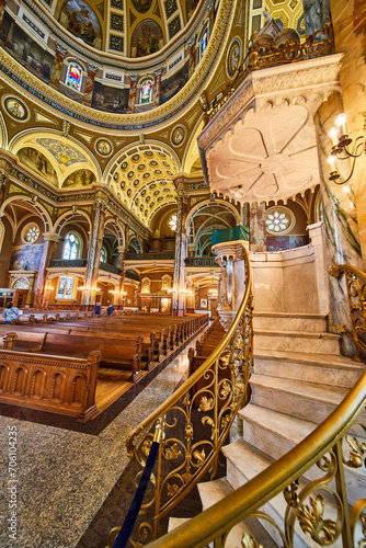 Majestic Cathedral Interior with Marble Staircase and Stained Glass
