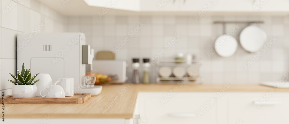 Side view of a kitchen countertop with kitchen appliances in a modern white kitchen. Side view of a kitchen countertop with kitchen appliances in a modern white kitchen.