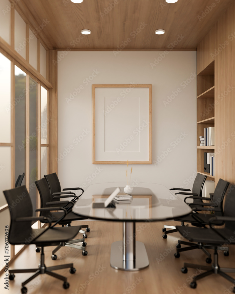 A minimal wood picture frame mockup on a white wall in a modern meeting room. A minimal wood picture frame mockup on a white wall in a modern meeting room.