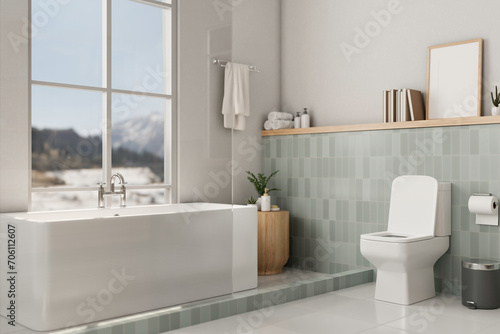 A beautiful  modern and clean bathroom with a toilet and a bathtub near by the window.