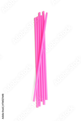 Pink plastic straws on white background