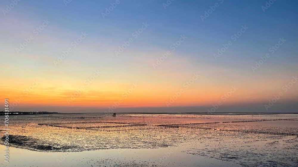 A beautiful sunset sunrise in the sea, silhouette style