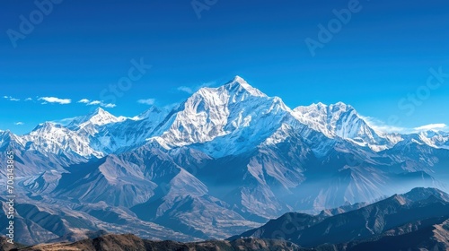 Snow-capped mountains with a clear blue sky