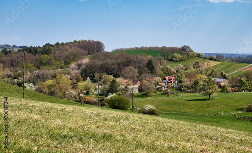 Hill going down to small German village in Rhineland Palatinate on a spring day.