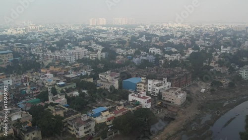 Aerial video of Anna Nagar, Aminjikarai, locals of an Indian neighbourhood in Chennai's metropolitan area, one of the most important commercials and slums. In the year 2024, Nelson Manickam Road photo