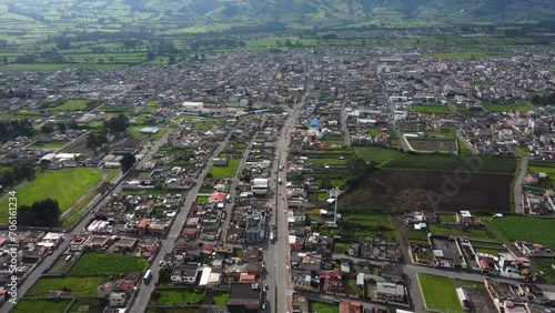 Panamericana sur E35 Ecuador highway divides city Machachi aerial view photo