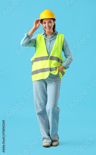 Female worker in reflective...