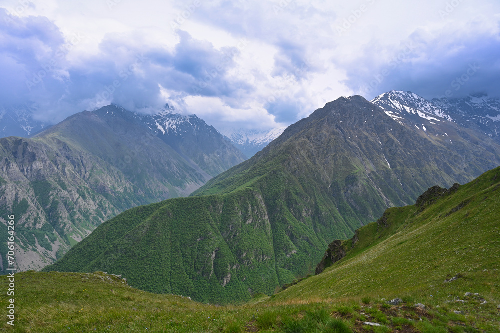 Fototapeta premium Thunderclouds over the Caucasus mountains near the Fiagdon valley