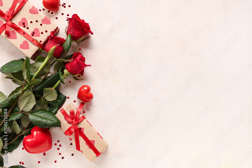 Beautiful roses with hearts and gift boxes on white grunge background. Valentine's Day celebration Beautiful roses with hearts and gift boxes on white grunge background. Valentine's Day celebration