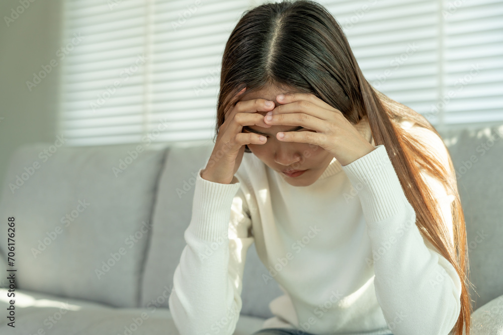 Depression and mental illness. Asian woman disappointed, sad after receiving bad news. Stressed girl confused with unhappy problems, arguing with boyfriend, cry and worry about unexpected pregnancy. Depression and mental illness. Asian woman disappointed, sad after receiving bad news. Stressed girl confused with unhappy problems, arguing with boyfriend, cry and worry about unexpected pregnancy.