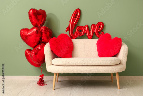 Stylish sofa with heart-sha...