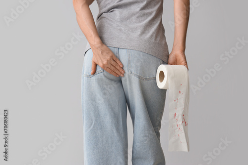 Mature woman with toilet pa...