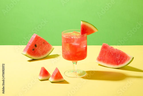 Close-up of a glass of watermelon juice with ice. The amount of water in watermelon has the effect of neutralizing gastric juice, thereby reducing the risk of epigastric pain.