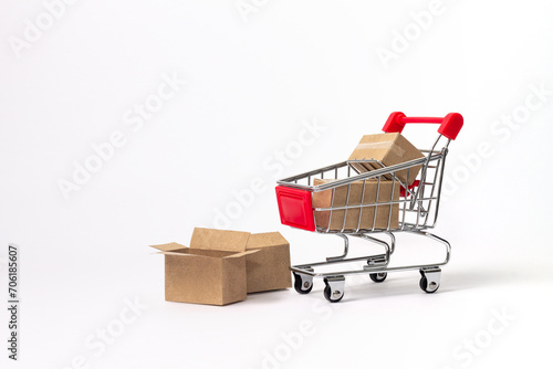 mini shopping cart with cardboard boxes