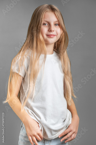 Portrait of cute little girl with long light hair