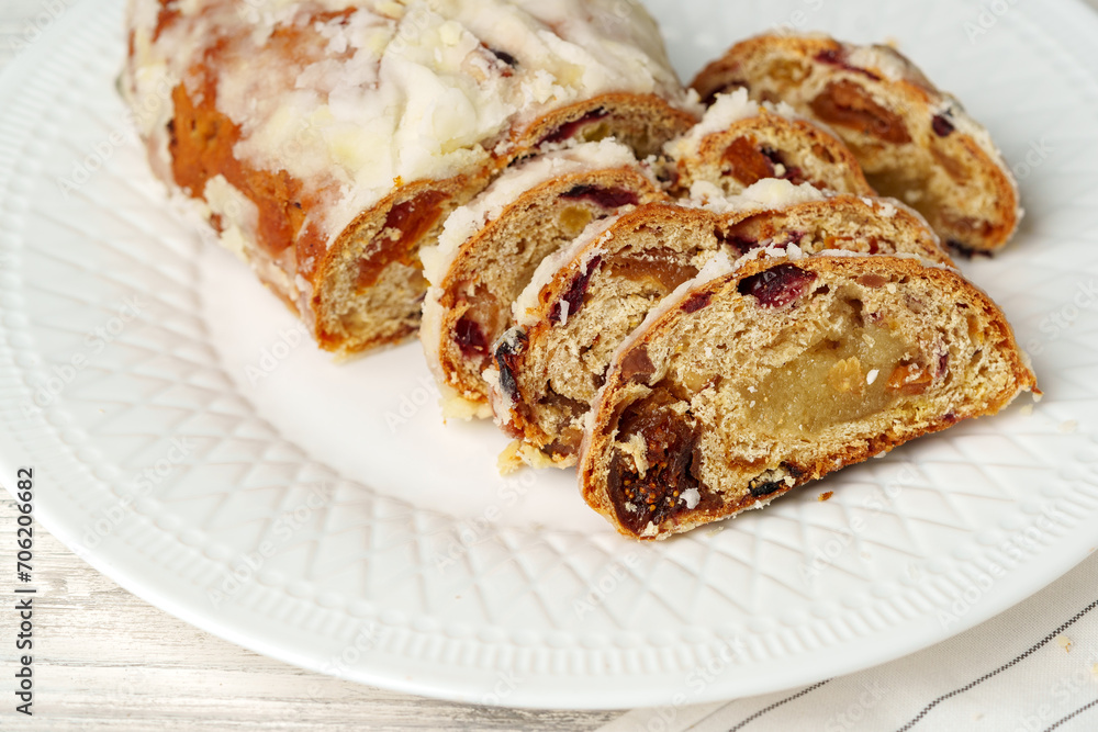 custom made wallpaper toronto digitalChristmas stollen on plate on white wooden table