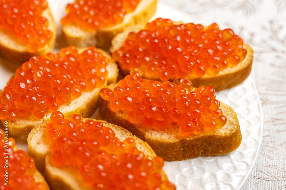 Sandwiches with red caviar. New Year's table. Sandwiches with red caviar. New Year's table.