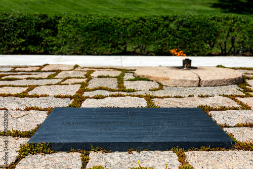 Tomb of President John F. Kennedy at Arlington National Military Cemetery, with the eternal flame on the monument in Washington DC, (USA).