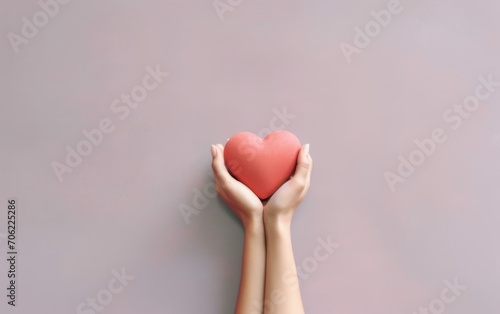 Woman holding hands near red heart on color background. Generative AI