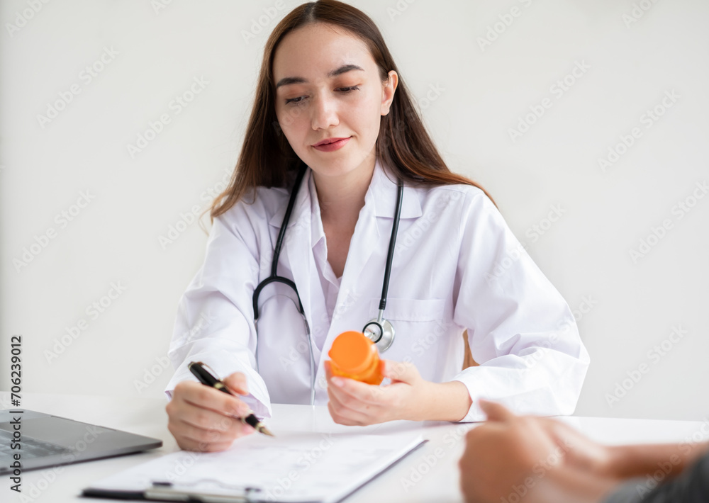 Female doctors who treat patients make an appointment to listen to the results after a physical examination and explain medical information and diagnose the disease. Medical concepts and good health Female doctors who treat patients make an appointment to listen to the results after a physical examination and explain medical information and diagnose the disease. Medical concepts and good health
