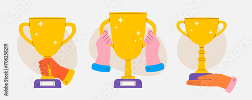 Hands holding Winner golden cups set vector illustration. Prize place trophy