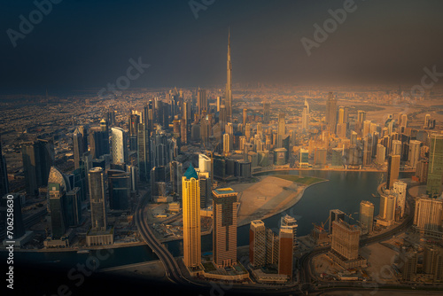 Golden Dawn: Aerial Majesty of Dubai's Skyline Bathed in Sunrise Splendor (ID: 706258630)