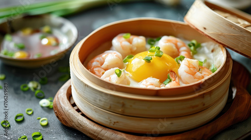 Steamed egg with shrimp and spring onions. Asian cuisine concept.