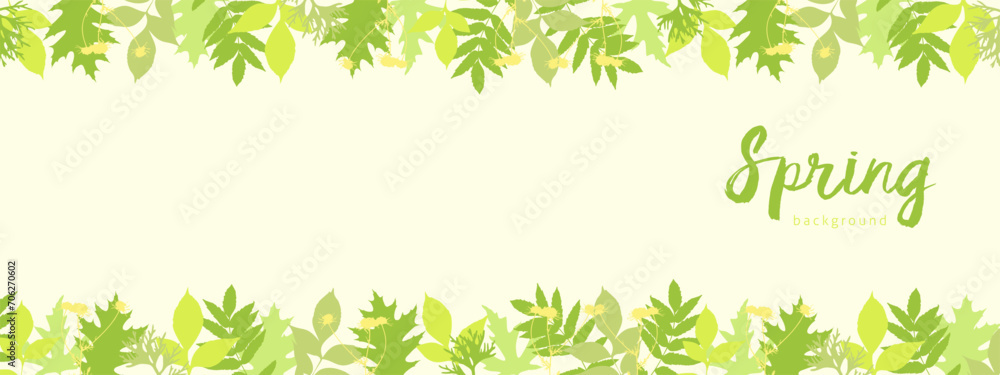 Spring light yellow background banner horizontal with bright young spring leaves.