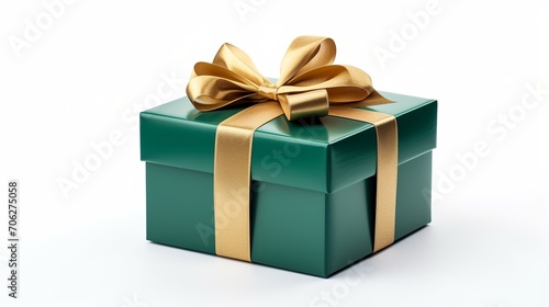 Against a white background, a green gift box with a gold bow and ribbon is isolated.