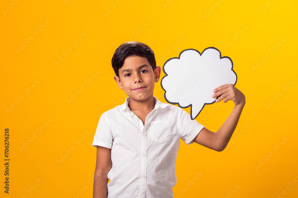 Child boy holding think cloud bubble card. Dreaming concept Child boy holding think cloud bubble card. Dreaming concept