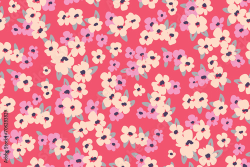 Seamless floral pattern, liberty ditsy print of mini flowers buds in a romantic motif. Pretty botanical surface design: hand drawn small flowers, tiny leaves on a pink background. Vector illustration.