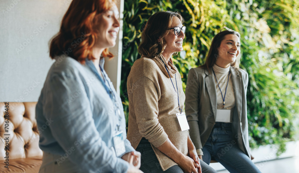 Successful collaboration: Multigenerational team of women at a productive business meeting