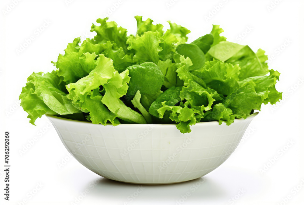 White Bowl Filled With Lettuce on Top of White Table White Bowl Filled With Lettuce on Top of White Table