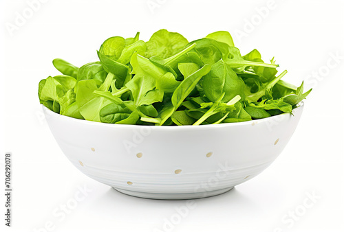 White Bowl Filled With Lettuce on Top of White Table