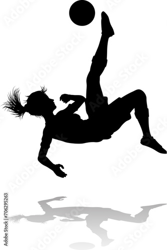 A female soccer football player woman in silhouettes