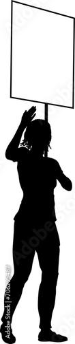 Protestor or demonstrator at a demonstration march, picket line or strike protest rally in silhouette. Holding up a banner or picket sign board placard.