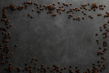 Coffee beans on gray background with space for text or drink menu