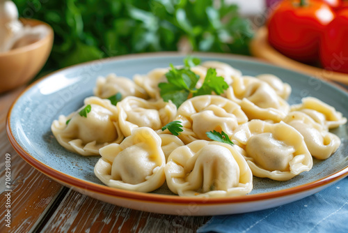 A plate of perfectly boiled pelmeni, traditional Russian dumplings filled with savory meat