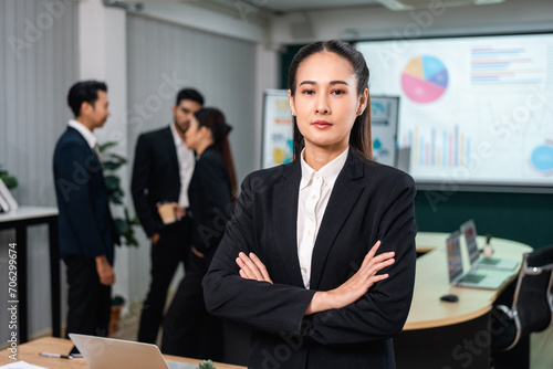 Asian business people team analyzing statistics financial. Team of businesspeople Meeting Conference Discussion Corporate Concept in office.