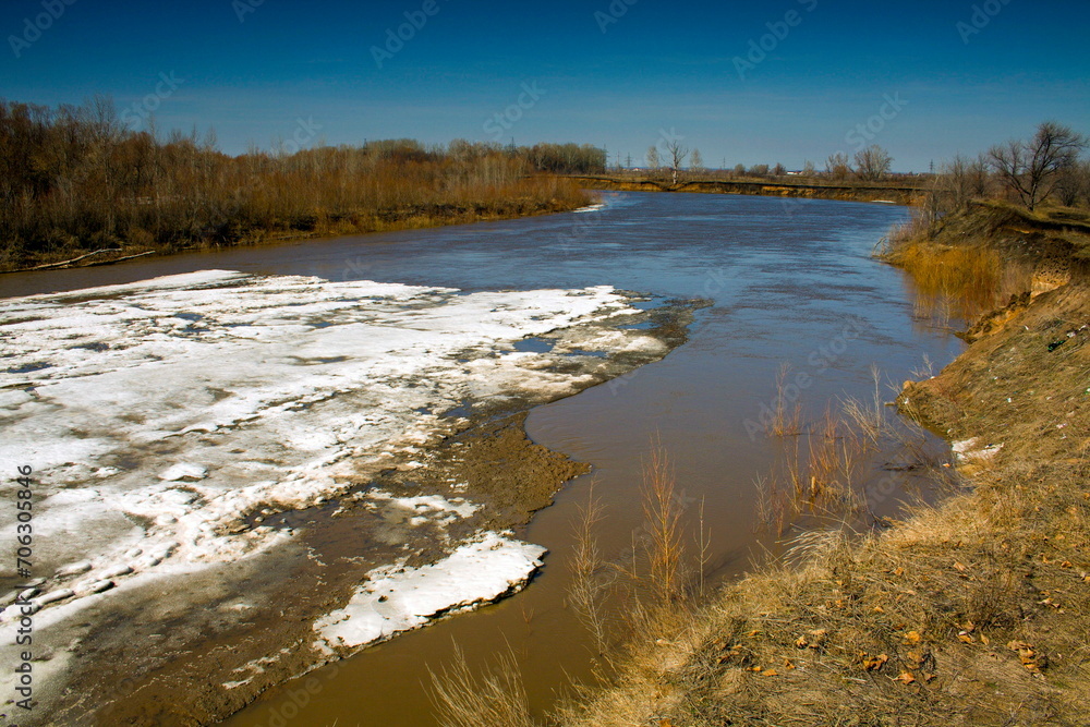 Ice drift on the river on a spring sunny day