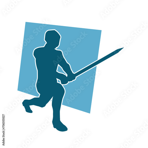 Silhouette of a male warrior in action pose with sword weapon. Silhouette of a man fighter carrying sword weapon.