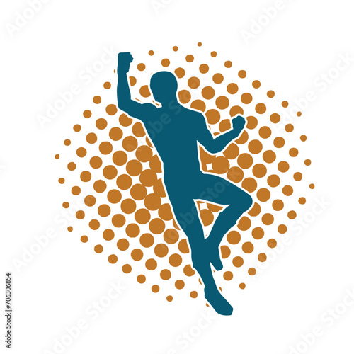 Silhouette of a man in oriental martial art pose. Silhouette of a male in martial art move.