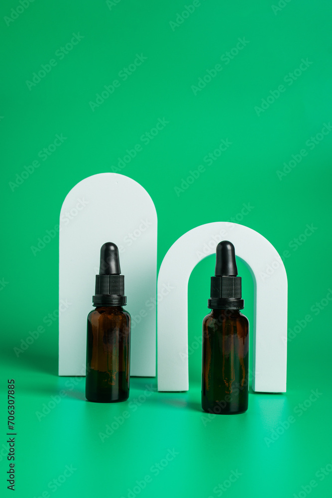 Serum skin care product on green background with skincare healthcare concept on green background. Serum skin care product on green background with skincare healthcare concept on green background.