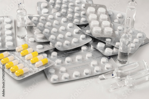 Medicines, antibiotics, antivirals and other tablets and pills for the treatment of various diseases. photo