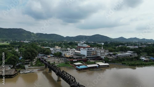 Majestic Traverse: Aerial Expedition Across the Mae Khwae River Suspension Bridge.