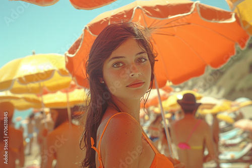 Beautiful young woman on beach in summer, vintage color