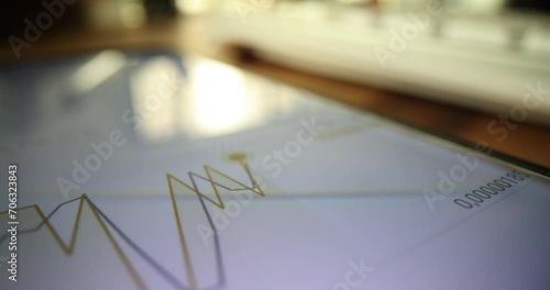 Online stock trading and Forex currency trading. Line chart at accelerated pace shows and changed rate of traded position