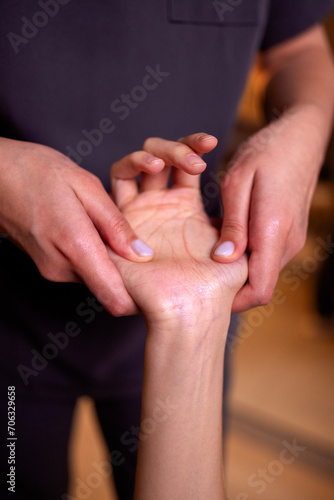 Close up of young female arms getting gentle hand massage